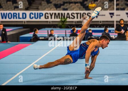 Melbourne, Australia. 12th Dec, 2014. Gymnast from France, Loris Frasca performing flares during floor exercise at the World Cup Gymnastics in Melbourne. (Photo by Alexander Bogatyrev/SOPA Image/Sipa USA) Credit: Sipa USA/Alamy Live News Stock Photo