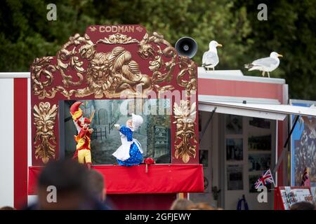 Llandudno coastal town in north Wales, promenade Codmans  Uk’s oldest Punch and Judy show performing on Llandudno promenade since 1864 Stock Photo