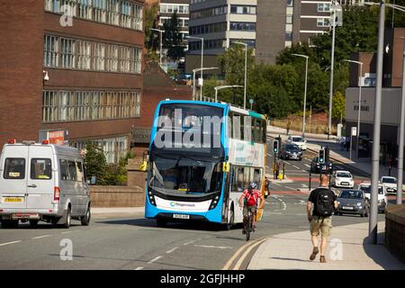 Stockport Wellington Road a 192 Stagecoach bus passing a cyclist in cycle lane Stock Photo