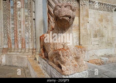 Details of medieval Griffin guardian statue and sculpture in front of the Duomo Cathedral entrance- Verona, Italy Stock Photo