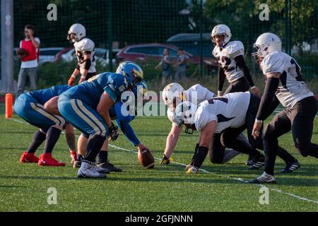 Kiev Ukraine, 15 August 2021, Players in sports uniforms on the field of playing American football. Ukrainian Championship Lvov Lions vs Kiev Capitals Stock Photo