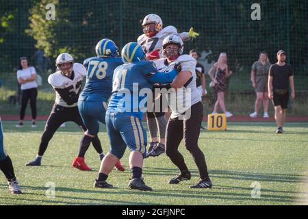 Kiev Ukraine, 15 August 2021, Players in sports uniforms on the field of playing American football. Ukrainian Championship Lvov Lions vs Kiev Capitals Stock Photo