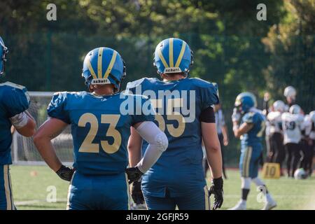 Kiev Ukraine, 15 August 2021, Players in sports uniforms on the field of playing American football. Ukrainian Championship Lvov Lions vs Kiev Capitals Stock Photo