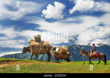 Yili, Yili, China. 26th Aug, 2021. Herdsmen in the Yili River Valley in Xinjiang. (Credit Image: © SIPA Asia via ZUMA Press Wire) Credit: ZUMA Press, Inc./Alamy Live News Credit: ZUMA Press, Inc./Alamy Live News Stock Photo