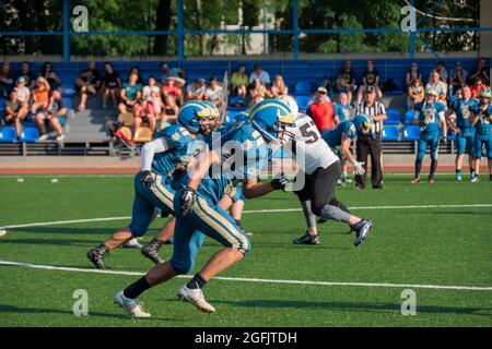 Kiev Ukraine, 15 August 2021, Players in sports uniforms on the field of playing American football. Ukrainian Championship Lvov Lions vs Kiev Capitals Stock Photo