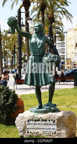 Sculpture tribute to the grape harvest in a Sitges garden, Barcelona, Catalunya, Spain, Europe Stock Photo