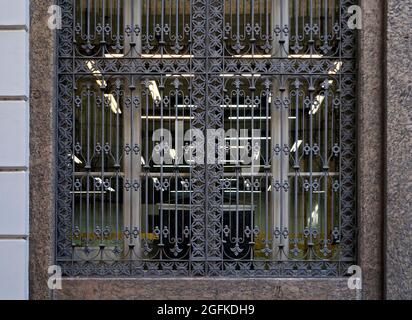 Ancient window with grid, Downtown Rio Stock Photo