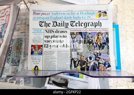 Daily Telegraph front page Covid 19 coronavirus pandemic newspaper headline 'NHS draws up plans to vaccinate 12-year-olds' 26 August 2021  London UK Stock Photo