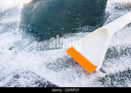 Scraper for cleaning ice from car windows Stock Photo