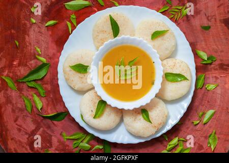 famous South Indian food Idly/idli is ready to serve. Stock Photo