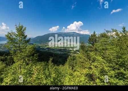Sugana valley or Valsugana with the small Levico Terme town and the lake of Caldonazzo and Levico. Tourist resort in Trento, Trentino, Italy. Stock Photo
