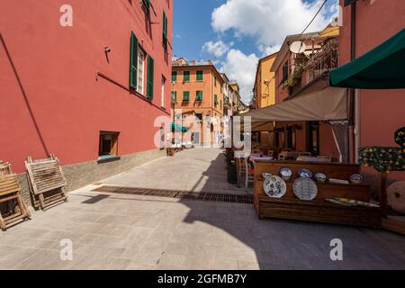 Street in downtown of Monterosso al Mare village with shops and restaurants, tourist resort in Cinque Terre, Liguria, La Spezia, Italy, Europe. Stock Photo