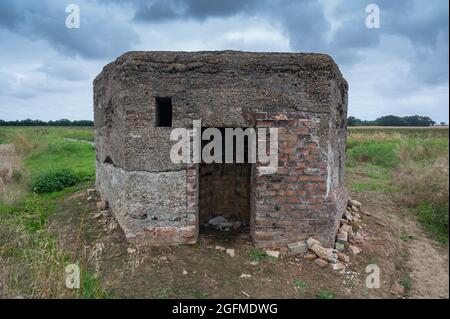 A second world war pill box in the middle of the countryside in norfolk england Stock Photo