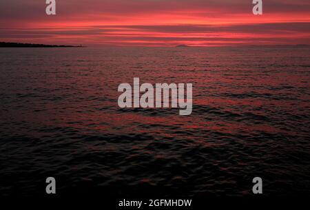Intense sunset at the coast of Reykjavik, Iceland Stock Photo