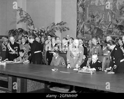 Count Galeazzo Ciano(standing between) Adolf Hitler and Joachim Ribbentrop signing the Pact of Steel (the military alliance between Nazi Germany and Fascist Italy) on 22 May 1939 Stock Photo