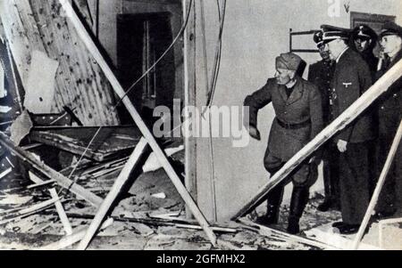 Hitler showing Mussolini the damaged room in his HQ Wolfsschanze near Rastenburg in East Prussia after the attempt on his life on 20 July 1944. (from left to right: Benito Mussolini, unknown, Adolf Hitler, unknown, Joachim von Ribbentrop) Stock Photo