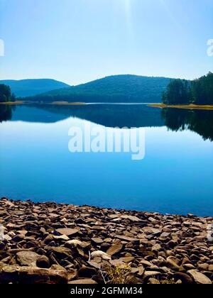 Cooper Lake, NY, the largest natural lake in the Catskills at 50% of its capacity due to drought Stock Photo