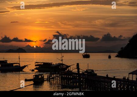 Harbor of Labuan Bajo at sunset. Flores, Indonesia. Stock Photo