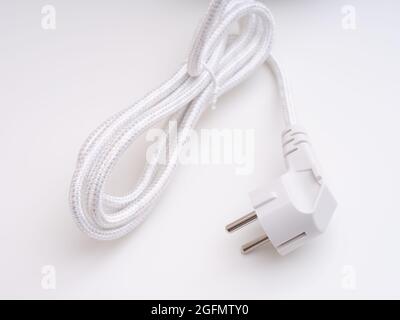 A tied up electric plug. Close up. Stock Photo