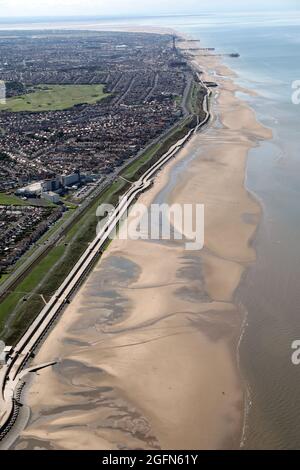aerial view of North Shore & Bispham, Blackpool and the Golden Mile beach (with Blackpool Tower and Blackpool Piers in the far distance) Stock Photo
