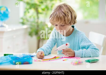 Crafts for Kids. Child with Hot Glue Gun Stock Image - Image of creativity,  craft: 230344331