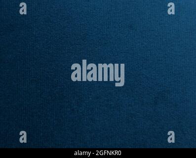 Full frame texture dark blue velvet showing fabric detail with copy space Stock Photo