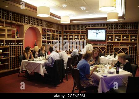 SAINT LOUIS, UNITED STATES - Jul 02, 2009: A view of people dining at an upscale restaurant in St. Louis, Missouri Stock Photo