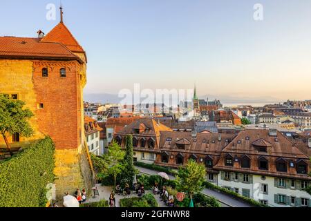 Panoramic view of Lausanne and Lake Geneva, capital city of Vaud Canton, Switzerland. It’s home to the International Olympic Committee headquarters, a Stock Photo