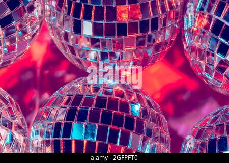 disco balls for decorationof a party on pink background Stock