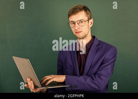 Teacher using modern software self education, searching inspiration concept Stock Photo