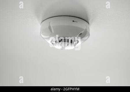 Smoke Carbon Monoxide And Fire Alarm Detector Stock Photo