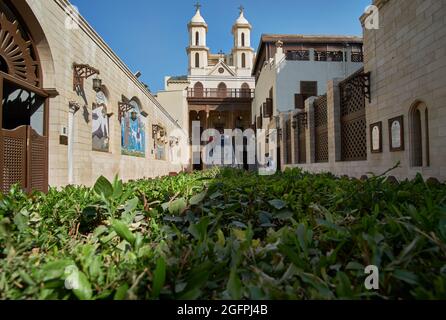 The hanging Church  (Saint Virgin Mary's Coptic Orthodox Church) in Old Cairo exterior daylight view showing the unique architecture of the Church Stock Photo