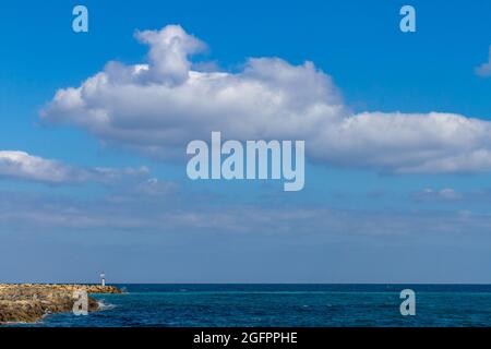 Lighthouse at the entrance to the port of Kolymvari in western Crete Stock Photo