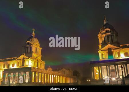 Greenwich, London, UK. 26th Aug, 2021. 'Borealis' by Dan Archer illuminates the skies above the Old Royal Naval College in the Royal Borough of Greenwich. 'Borealis' is a mesmerising recreation of the Northern Lights in the sky. It is part of the annual Greenwich and Docklands Festival, which will run from August 27th- September 11th, 2021. Credit: Imageplotter/Alamy Live News