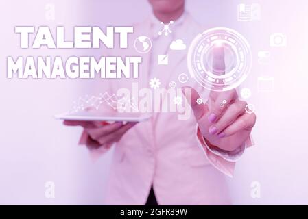 Sign displaying Talent Management. Conceptual photo anticipation of required human capital for an organization Business Woman Touching Digital Data On Stock Photo