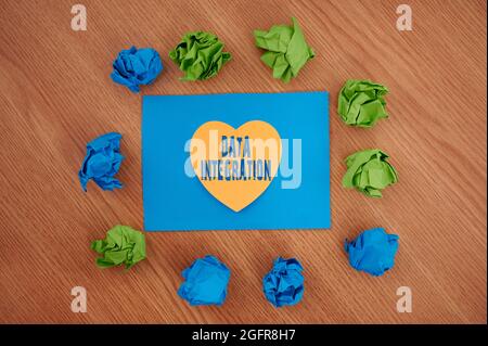 Sign displaying Data Integration. Business idea involves combining data residing in different sources Colorful Crumpled Papers Circular Pattern Stock Photo