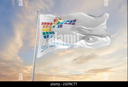 flag of West Hollywood, California at cloudy sky background on sunset, panoramic view. Patriotic concept about Boston and copy space for wide banner. Stock Photo