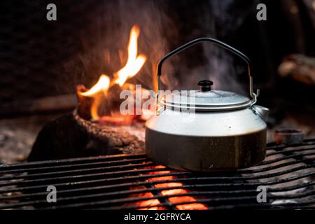 blue enamel coffee pot over an open fire, cowboy style, Alpine