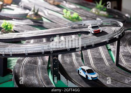 Racing car on the toy race track Stock Photo