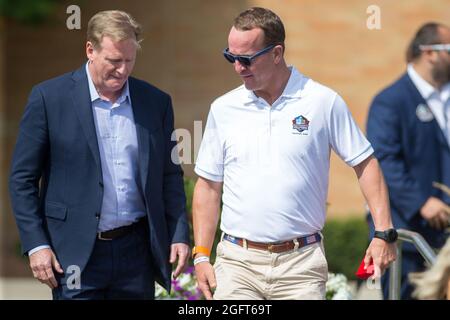 NFL Commissioner Roger Goodell and Pro Football Hall of Famer Peyton Manning have a discussion in front of the Pro Football Hall of Fame, Friday, Aug. Stock Photo