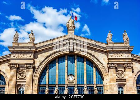 Gare du Nord North Train Station Flag Statues Building Paris France. Built in 1860s, one of six railroad stations in Paris Busiest railway station in Stock Photo