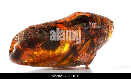 amber, fossilized tree resin isolated with shadow on white background (3d render) Stock Photo