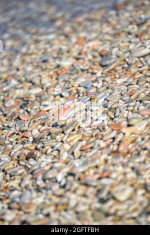 Smooth round pebbles texture background. Pebble sea Stock Photo