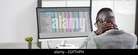 Neck Pain Bad Posture Stress At Computer In Office Stock Photo