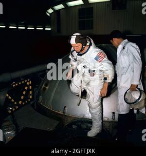 (1 Nov. 1968) --- Astronaut Frank Borman, Apollo 8 commander, egresses the gondola in Building 29 after centrifuge training in the Manned Spacecraft Center's (MSC) Flight Acceleration Facility (FAF). Stock Photo