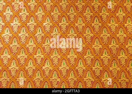 art pattern stucco gold red temple wall background Stock Photo