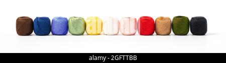 knitting threads or sewing threads in close-up on a white background are isolated Stock Photo