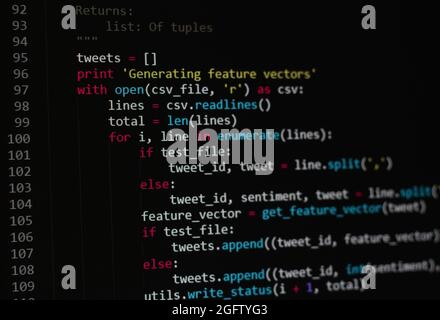 developer python, java script, html, css source code on monitor screen. writing script of software developer. program coding. programmer editing code Stock Photo