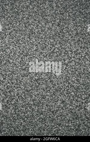 Vertical shot of Polished Black And White Granite Texture, Architecture Pattern Stock Photo