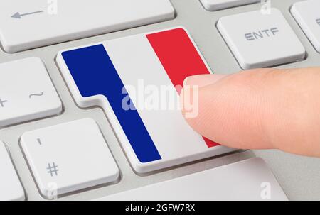 A keyboard with a labeled button - Flag of France Stock Photo - Alamy